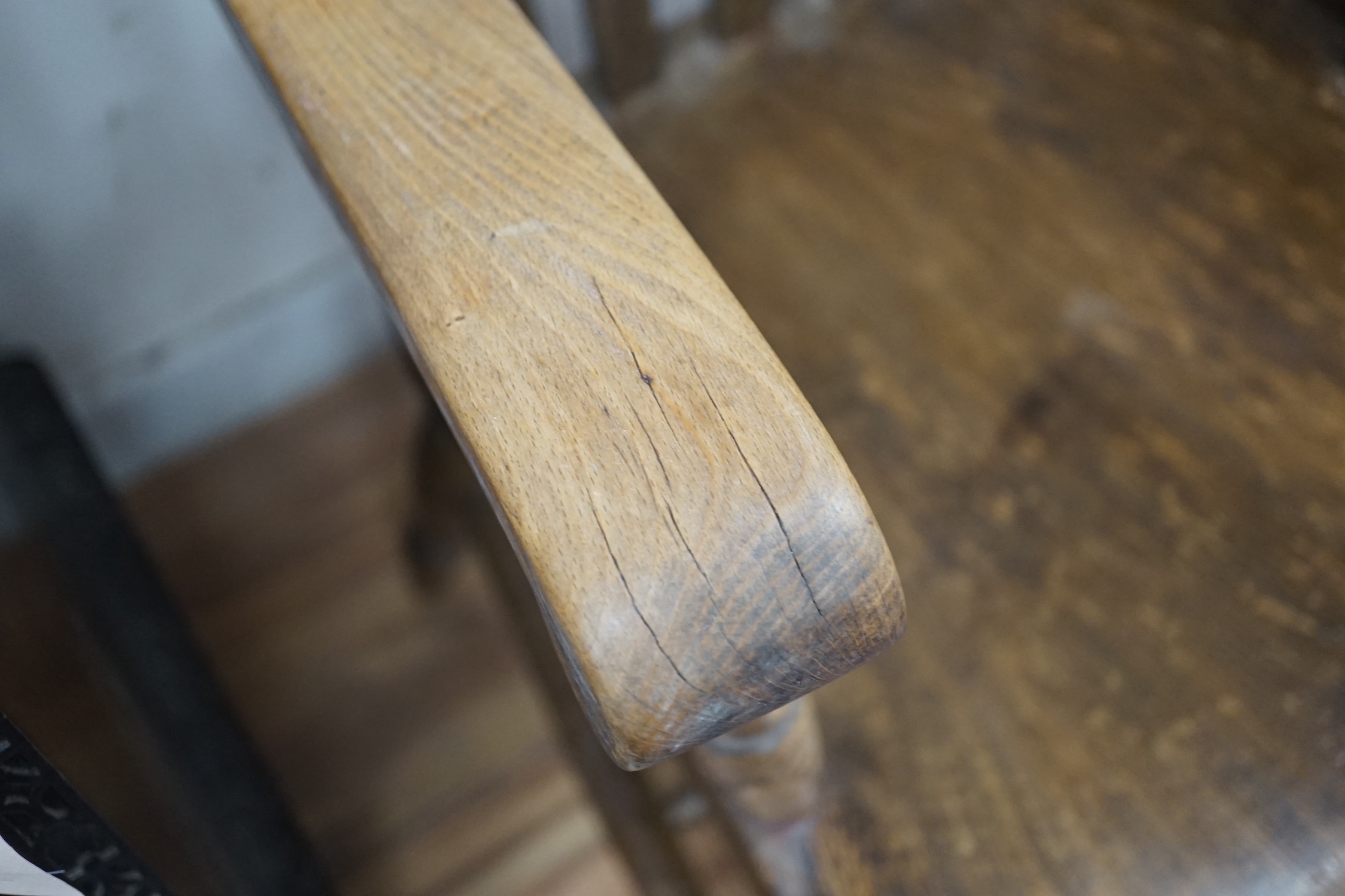 A Victorian elm and beech lathe back elbow chair, width 61cm, depth 48cm, height 112cm